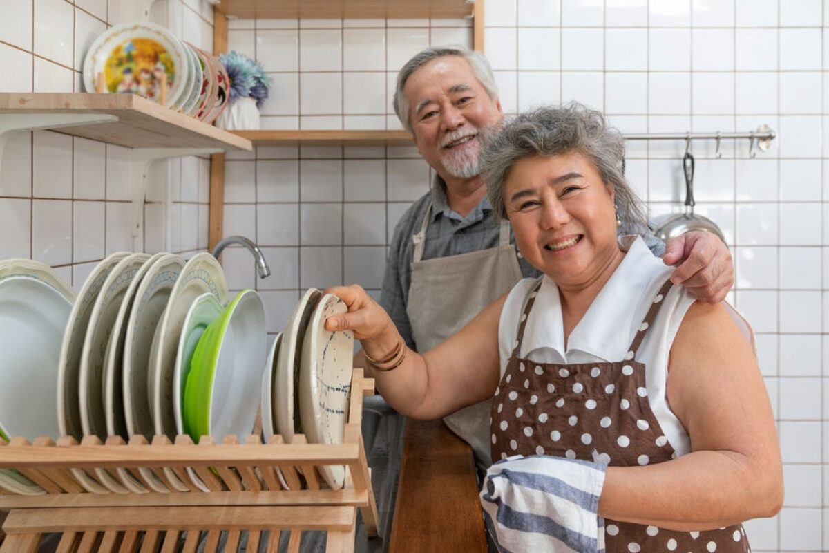 happy-couple-asian-elder-smiling-and-washing-dishe-2023-06-06-00-58-34-utc_c